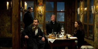 Jude, Stephen and Noomi Sat Round the Dinner Table