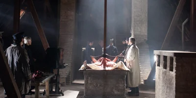 Dead Body with a Large Axe Through it