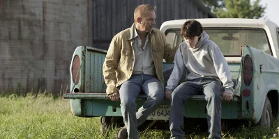 Jonathan Kent and Boy Sat on Truck