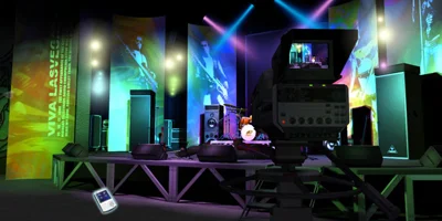 A lit stage with TV cameras around it